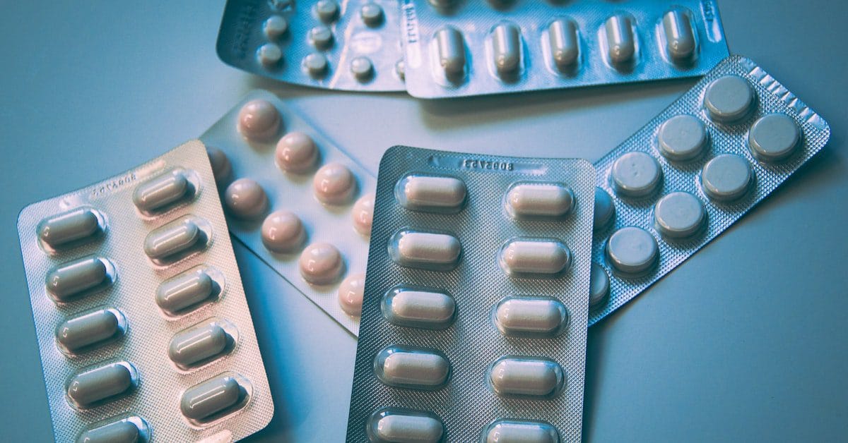 Medication and organized workspace representing ADHD treatment options