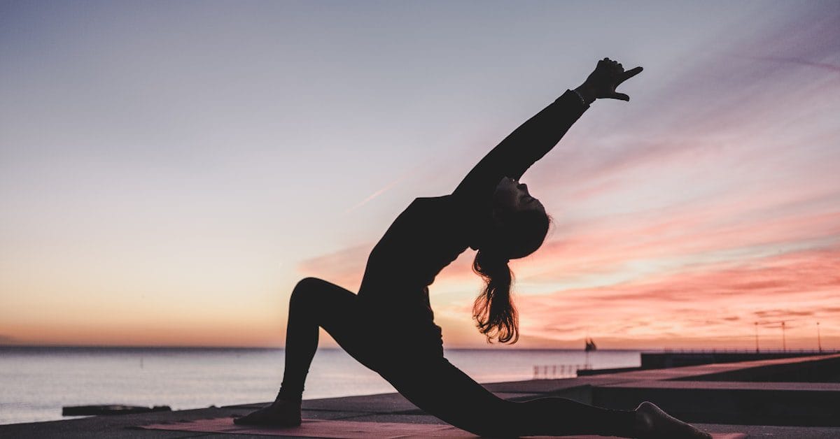 Person practicing mindfulness meditation to manage anxiety and prevent complications